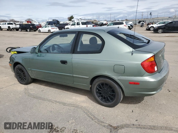 2003 Hyundai Accent GL with VIN KMHCG35C13U270585, listed as a Copart auction lot 50197935 with 53,822 mi miles and Salvage Title. Bid and sale history available at carsss.com. Image 2.