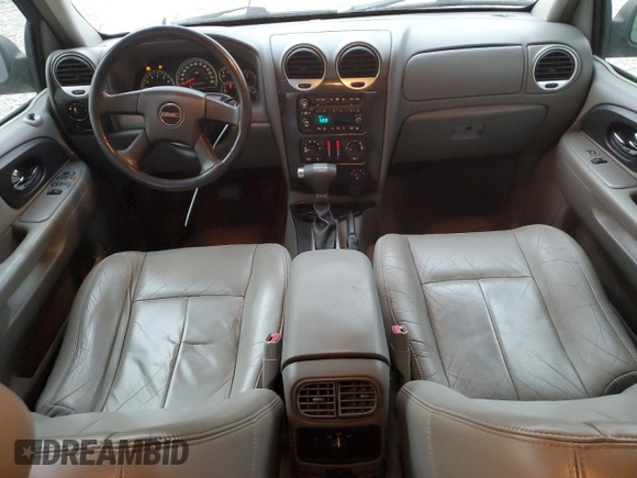 2006 GMC Envoy SLT with VIN 1GKDS13S062186025, listed as a Copart auction lot 79041904 with 220,053 mi miles and Salvage Title. Bid and sale history available at carsss.com. Image 8.