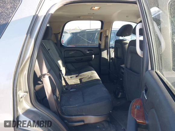 2012 GMC Yukon SLE with VIN 1GKS1AE06CR218372, listed as a IAAI auction lot 41591288 with 166,596 mi miles. Bid and sale history available at carsss.com. Image 8.