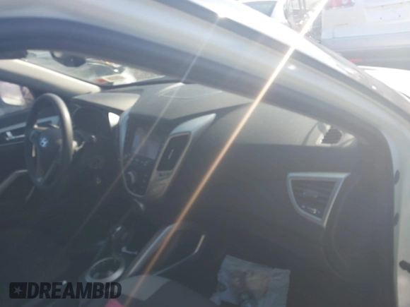 2013 Hyundai Veloster w/Gray Int with VIN KMHTC6AD2DU115735, listed as a IAAI auction lot 39404347 with 166,840 mi miles and . Bid and sale history available at DreamBid. Image 5.