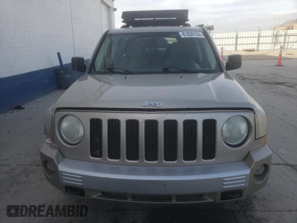 2009 Jeep Patriot z VIN 1J8FF48B39D208118, wystawiony jako Copart lot #81838154 z przebiegiem 182 457 mil mil oraz Szkoda całkowita • Salvage title. Historia ofert i sprzedaży dostępna na DreamBid. Obrazek 5.