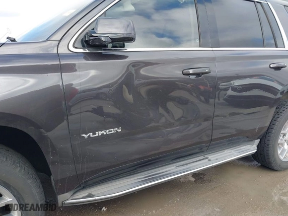 2015 GMC Yukon SLT with VIN 1GKS2BKC3FR103606, listed as a IAAI auction lot 41520779 with 152353 miles. Bid and sale history available at carsss.com. Image 6.