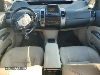 2007 Toyota Prius z VIN JTDKB20UX77600124, wystawiony jako Copart lot #61400525 z przebiegiem 102 957 mil mil oraz Czysty tytuł • Clean title. Historia ofert i sprzedaży dostępna na DreamBid. Obrazek 8.