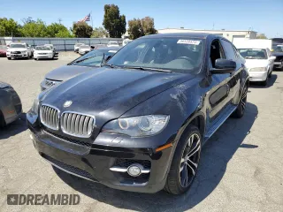 2011 BMW X6 50i with VIN 5UXFG8C55BLZ96648, listed as a Copart auction lot 56528574 with 134,321 mi miles and Salvage Title. Bid and sale history available at carsss.com. Image 1.