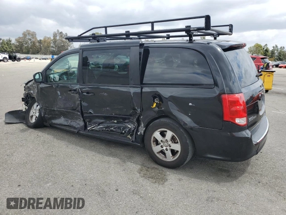 2013 Dodge Grand Caravan SXT with VIN 2C4RDGCGXDR581399, listed as a Copart auction lot 54787935 with 162,970 mi miles and Salvage Title. Bid and sale history available at DreamBid. Image 2.