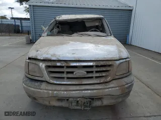 2001 Ford F-150 SuperCrew XLT with VIN 1FTRW07W01KA40634, listed as a Copart auction lot 71674184 with 0 mi miles and Salvage Title. Bid and sale history available at carsss.com. Image 5.