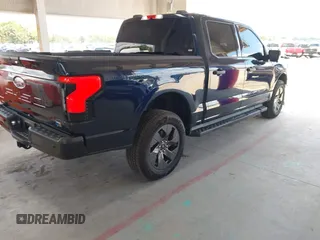 2024 Ford F-150 Lightning XLT с VIN 1FTVW3LK9RWG08466, выставлен на аукционе IAAI как лот 42251872 с пробегом 3 045 миль миль и . История ставок и продаж доступна на DreamBid. Изображение 4.