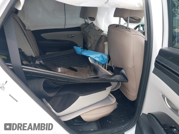 2022 Hyundai Tucson SEL z VIN 5NMJC3AE3NH057663, wystawiony jako IAAI lot #42428386 z przebiegiem 78 740 mil mil oraz . Historia ofert i sprzedaży dostępna na DreamBid. Obrazek 8.