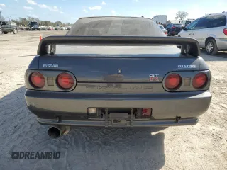 1990 Nissan Skyline z VIN BNR32010431, wystawiony jako Copart lot #78496994 z przebiegiem 182 401 mil mil oraz Nie do naprawy • Non repairable. Historia ofert i sprzedaży dostępna na DreamBid. Obrazek 6.