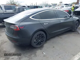 2018 Tesla Model 3 Long Range Battery with VIN 5YJ3E1EA7JF012249, listed as a IAAI auction lot 41782972 with 103,412 mi miles. Bid and sale history available at carsss.com. Image 4.