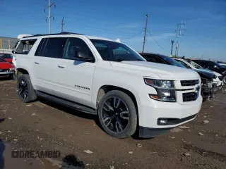 2020 Chevrolet Suburban Premier with VIN 1GNSKJKJXLR123259, listed as a Copart auction lot 46434524 with 118,367 mi miles and . Bid and sale history available at DreamBid. Image 4.