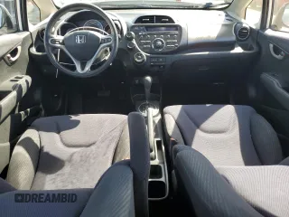 2012 Honda Fit Sport with VIN JHMGE8H50CC009958, listed as a Copart auction lot 55423075 with 117,618 mi miles and Salvage Title. Bid and sale history available at DreamBid. Image 8.