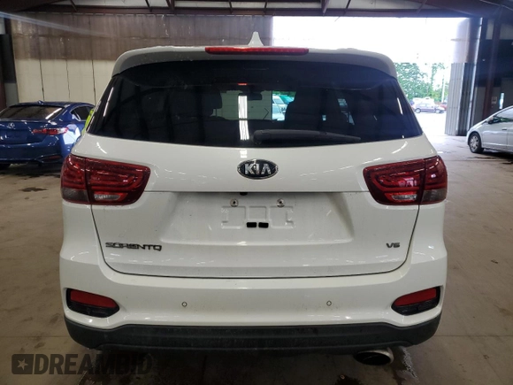 2019 Kia Sorento LX z VIN 5XYPGDA59KG456393, wystawiony jako Copart lot #61352805 z przebiegiem 102 479 mil mil oraz Czysty tytuł • Clean title. Historia ofert i sprzedaży dostępna na DreamBid. Obrazek 6.