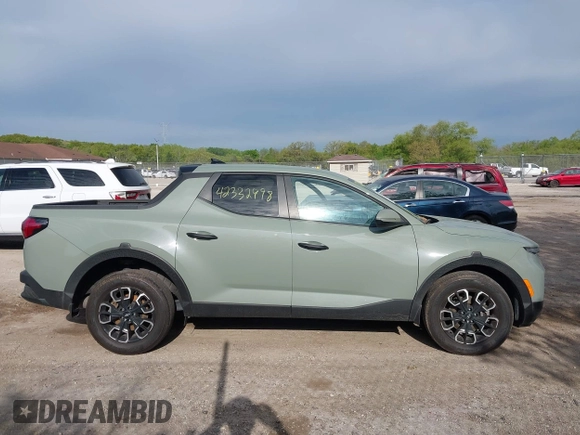 2023 Hyundai Santa Cruz SEL with VIN 5NTJBDAE9PH076525, listed as a IAAI auction lot 42332998 with 41,362 mi miles and . Bid and sale history available at DreamBid. Image 13.