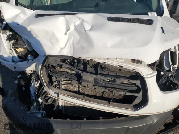 2019 Ford Transit z VIN 1FTYE2CM1KKB36255, wystawiony jako Copart lot #85185864 z przebiegiem 72 053 mil mil oraz Szkoda całkowita • Salvage title. Historia ofert i sprzedaży dostępna na DreamBid. Obrazek 12.