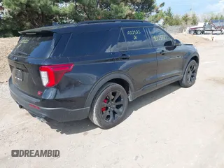 2023 Ford Explorer ST z VIN 1FM5K8GC7PGA12321, wystawiony jako IAAI lot #42125721 z przebiegiem 27 856 mil mil oraz . Historia ofert i sprzedaży dostępna na DreamBid. Obrazek 4.
