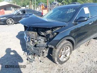 2017 Hyundai Santa Fe 2.4L z VIN 5NMZU3LB8HH031180, wystawiony jako IAAI lot #42242405 z przebiegiem 139 739 mil mil oraz . Historia ofert i sprzedaży dostępna na DreamBid. Obrazek 6.