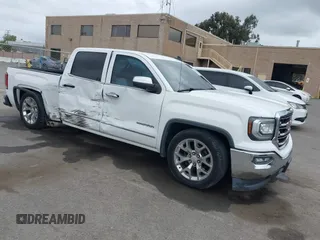 2018 GMC Sierra 1500 SLT with VIN 3GTP1NEC3JG242404, listed as a IAAI auction lot 42046151 with 73,379 mi miles and . Bid and sale history available at DreamBid. Image 1.