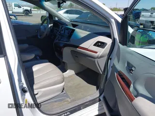 2011 Toyota Sienna XLE with VIN 5TDDK3DCXBS029961, listed as a IAAI auction lot 42228356 with 251,571 mi miles and . Bid and sale history available at DreamBid. Image 5.