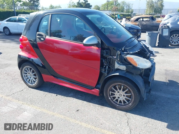2013 Smart fortwo Pure z VIN WMEEJ3BAXDK632221, wystawiony jako IAAI lot #42243706 z przebiegiem 75 815 mil mil oraz . Historia ofert i sprzedaży dostępna na DreamBid. Obrazek 1.