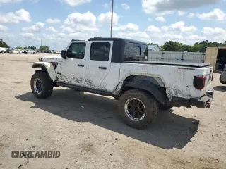 2020 Jeep Gladiator Sport S z VIN 1C6JJTAG3LL215977, wystawiony jako Copart lot #55012635 z przebiegiem Nie podano mil oraz Szkoda całkowita • Salvage title. Historia ofert i sprzedaży dostępna na DreamBid. Obrazek 2.