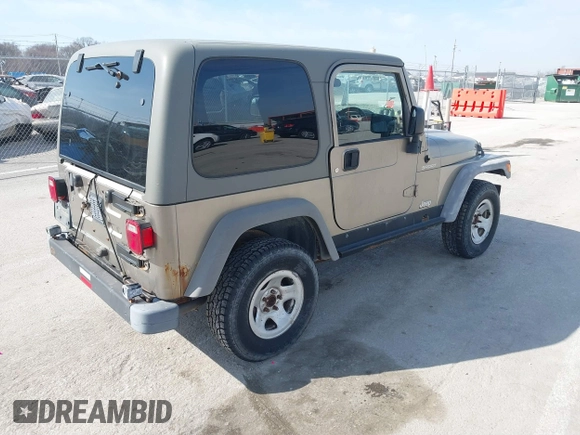 2006 Jeep Wrangler Sport Right Hand Drive with VIN 1J4F449S46P716520, listed as a IAAI auction lot 41763887 with 236,816 mi miles. Bid and sale history available at carsss.com. Image 4.