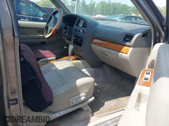 2001 Infiniti QX4 with VIN JNRDR09X11W201136, listed as a IAAI auction lot 41904963 with 198,345 mi miles and . Bid and sale history available at DreamBid. Image 5.