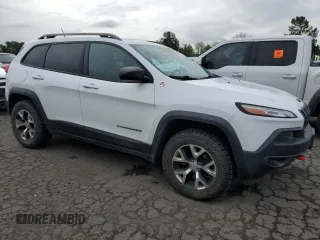 2014 Jeep Cherokee Trailhawk with VIN 1C4PJMBS8EW156633, listed as a Copart auction lot 58197675 with 133,029 mi miles and Clean title. Bid and sale history available at DreamBid. Image 4.