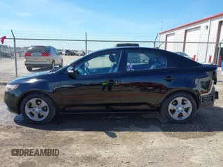 2010 Kia Forte EX z VIN KNAFU4A23A5080126, wystawiony jako IAAI lot #41878879 z przebiegiem 165 521 mil mil oraz . Historia ofert i sprzedaży dostępna na DreamBid. Obrazek 15.