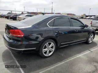 2014 Volkswagen Passat SEL Premium z VIN 1VWCN7A36EC077099, wystawiony jako Copart lot #58440905 z przebiegiem 144 462 mil mil oraz Szkoda całkowita • Salvage title. Historia ofert i sprzedaży dostępna na DreamBid. Obrazek 3.