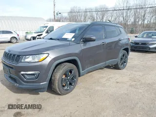2019 Jeep Compass Latitude with VIN 3C4NJDBB4KT593022, listed as a IAAI auction lot 41627841 with 69,443 mi miles and . Bid and sale history available at DreamBid. Image 2.