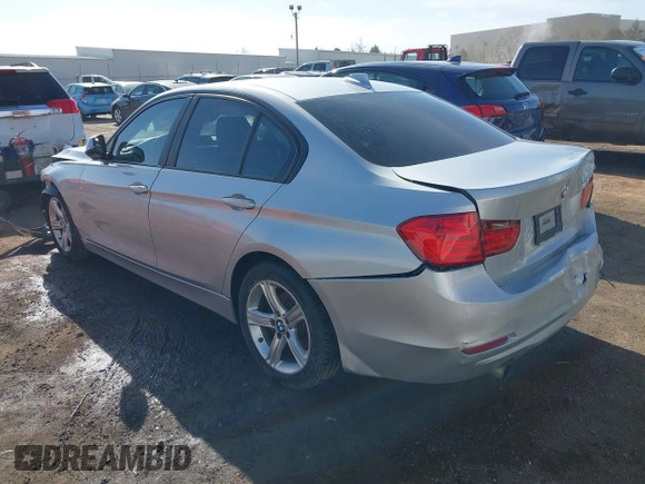2014 BMW 3 Series 320i with VIN WBA3B1G58ENS81101, listed as a IAAI auction lot 38950717 with 1 mi miles. Bid and sale history available at carsss.com. Image 3.