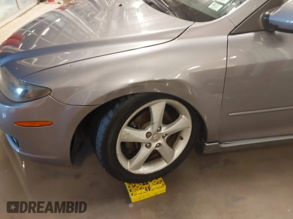 2008 Mazda 6 i Sport VE with VIN 1YVHP80C385M19167, listed as a IAAI auction lot 41282729 with 203,185 mi miles. Bid and sale history available at carsss.com. Image 6.