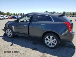 2014 Cadillac SRX Performance Collection z VIN 3GYFNCE36ES687267, wystawiony jako Copart lot #58242255 z przebiegiem 167 577 mil mil oraz Szkoda całkowita • Salvage title. Historia ofert i sprzedaży dostępna na DreamBid. Obrazek 2.