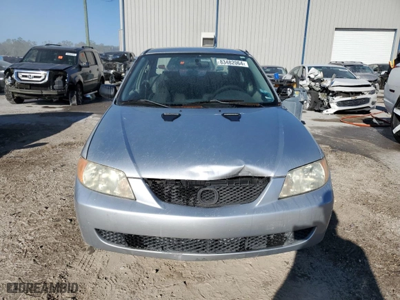 2001 Mazda Protege DX with VIN JM1BJ222210417508, listed as a Copart auction lot 83482064 with 0 mi miles and Salvage Title. Bid and sale history available at carsss.com. Image 5.