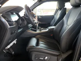 2020 BMW X5 xDrive40i with VIN 5UXCR6C02L9C72472, listed as a Copart auction lot 48023145 with 59,200 mi miles and Salvage title. Bid and sale history available at DreamBid. Image 7.