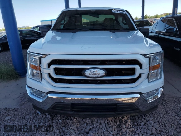 2022 Ford F-150 XL with VIN 1FTMF1C5XNKD23707, listed as a Copart auction lot 70062144 with 58,649 mi miles and Salvage title. Bid and sale history available at DreamBid. Image 5.