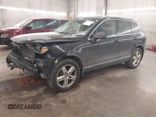 2012 Volkswagen Touareg Sport with VIN WVGEF9BP8CD009511, listed as a IAAI auction lot 41457989 with 87,325 mi miles and . Bid and sale history available at DreamBid. Image 18.