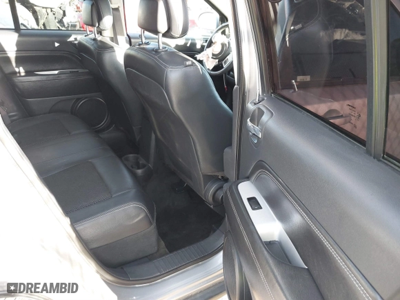 2016 Jeep Compass High Altitude Edition with VIN 1C4NJCEA1GD773763, listed as a IAAI auction lot 41601105 with 113,813 mi miles. Bid and sale history available at carsss.com. Image 8.
