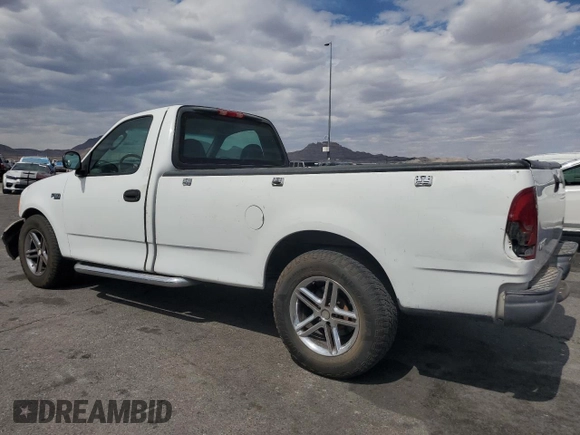 2004 Ford F-150 XL with VIN 2FTRF17294CA59985, listed as a Copart auction lot 55296195 with 220,933 mi miles and Salvage title. Bid and sale history available at DreamBid. Image 2.