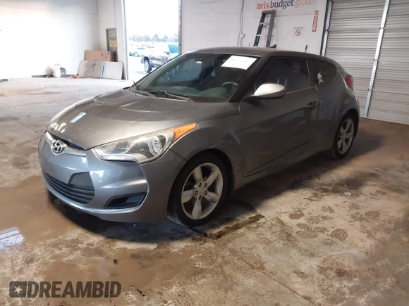 2013 Hyundai Veloster w/Gray Int with VIN KMHTC6AD4DU117924, listed as a IAAI auction lot 41339465 with 156,004 mi miles. Bid and sale history available at carsss.com. Image 18.