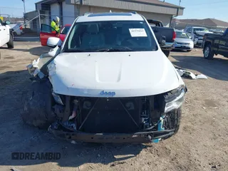 2018 Jeep Grand Cherokee Summit with VIN 1C4RJFJT4JC212819, listed as a IAAI auction lot 41975614 with 88,112 mi miles and . Bid and sale history available at DreamBid. Image 13.