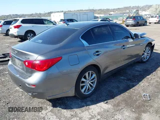 2015 Infiniti Q50 Premium with VIN JN1BV7AR2FM392399, listed as a IAAI auction lot 41978343 with 108,679 mi miles and . Bid and sale history available at DreamBid. Image 4.
