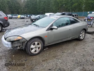 1999 Mercury Cougar z VIN 1ZWFT6033X5606655, wystawiony jako Copart lot #86642594 z przebiegiem Nie podano mil oraz Szkoda całkowita • Salvage title. Historia ofert i sprzedaży dostępna na DreamBid. Obrazek 1.