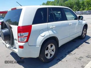 2011 Suzuki Grand Vitara Premium z VIN JS3TD0D2XB4103016, wystawiony jako IAAI lot #42568549 z przebiegiem 156 595 mil mil oraz . Historia ofert i sprzedaży dostępna na DreamBid. Obrazek 4.