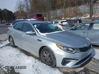 2019 Kia Optima LX z VIN 5XXGT4L3XKG294513, wystawiony jako IAAI lot #41345191 z przebiegiem 101 345 mil mil oraz . Historia ofert i sprzedaży dostępna na DreamBid. Obrazek 1.