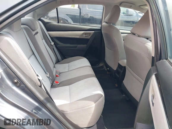 2018 Toyota Corolla L with VIN 5YFBURHE8JP770696, listed as a IAAI auction lot 42386025 with 63,224 mi miles and . Bid and sale history available at DreamBid. Image 8.
