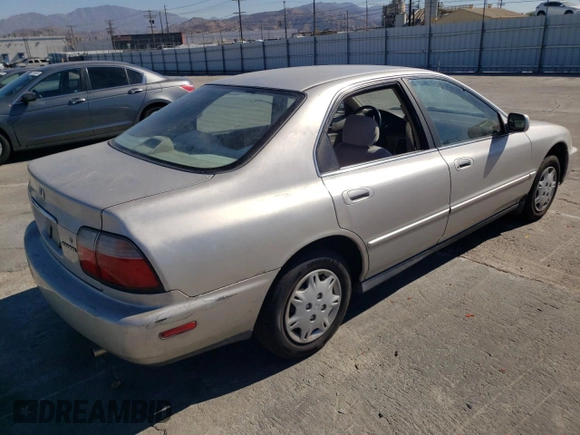 1996 Honda Accord Value with VIN 1HGCD5691TA249900, listed as a Copart auction lot 77683144 with 155,178 mi miles and Salvage Title. Bid and sale history available at DreamBid. Image 3.