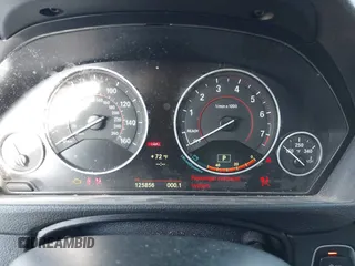 2014 BMW 3 Series 328i with VIN WBA3C1C52EK116956, listed as a IAAI auction lot 41907691 with 125,856 mi miles. Bid and sale history available at carsss.com. Image 7.