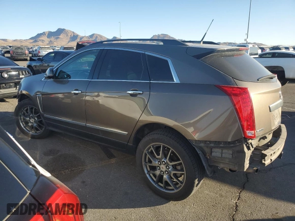 2014 Cadillac SRX z VIN 3GYFNAE34ES561414, wystawiony jako Copart lot #44760395 z przebiegiem 131 723 mil mil oraz Szkoda całkowita • Salvage title. Historia ofert i sprzedaży dostępna na DreamBid. Obrazek 2.